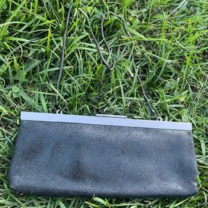 Worn Calvin Klein black clutch black chain strap